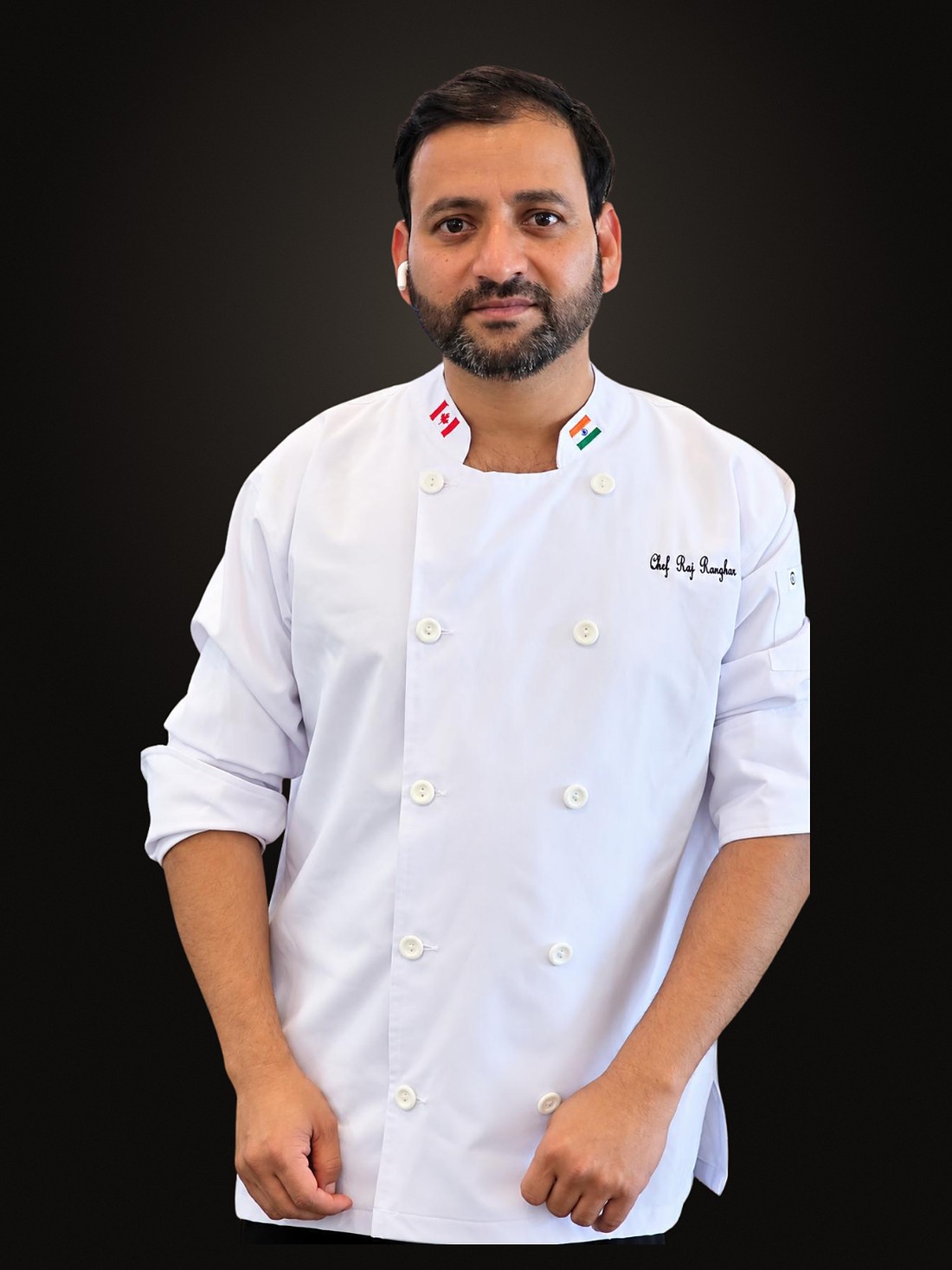 Chef Rajpal Singh Ranghar in chef whites, photographed in his kitchen