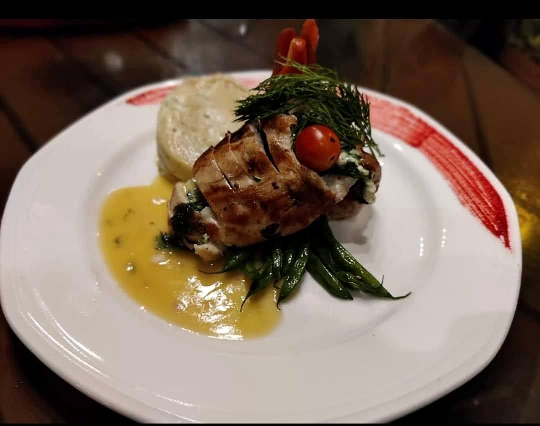 Stuffed Chicken Breast with Saffron Sauce plated by Chef Rajpal Singh Ranghar